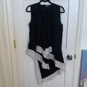 Black and white blouse, great for over jeans or leggings.  100% polyester
